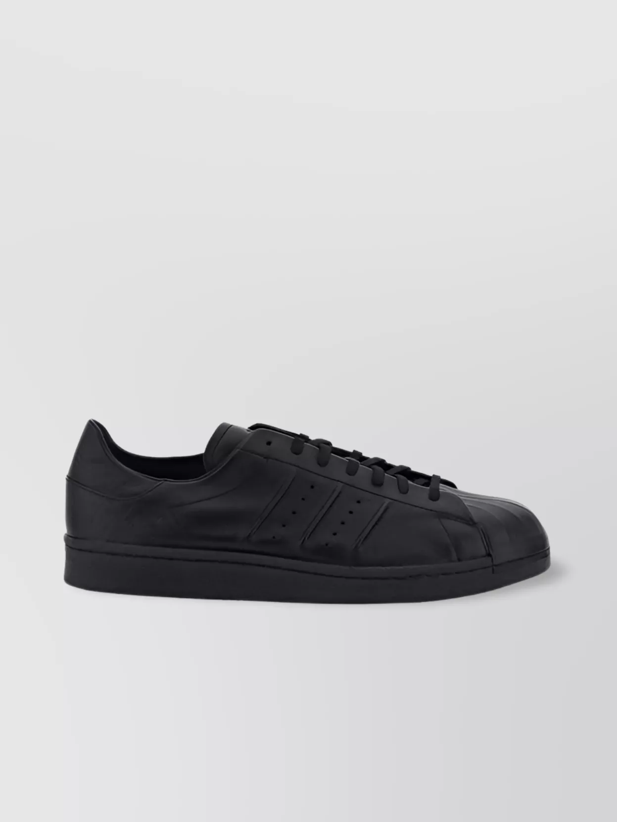 Y-3   Leather low-top sneakers perforated stripes